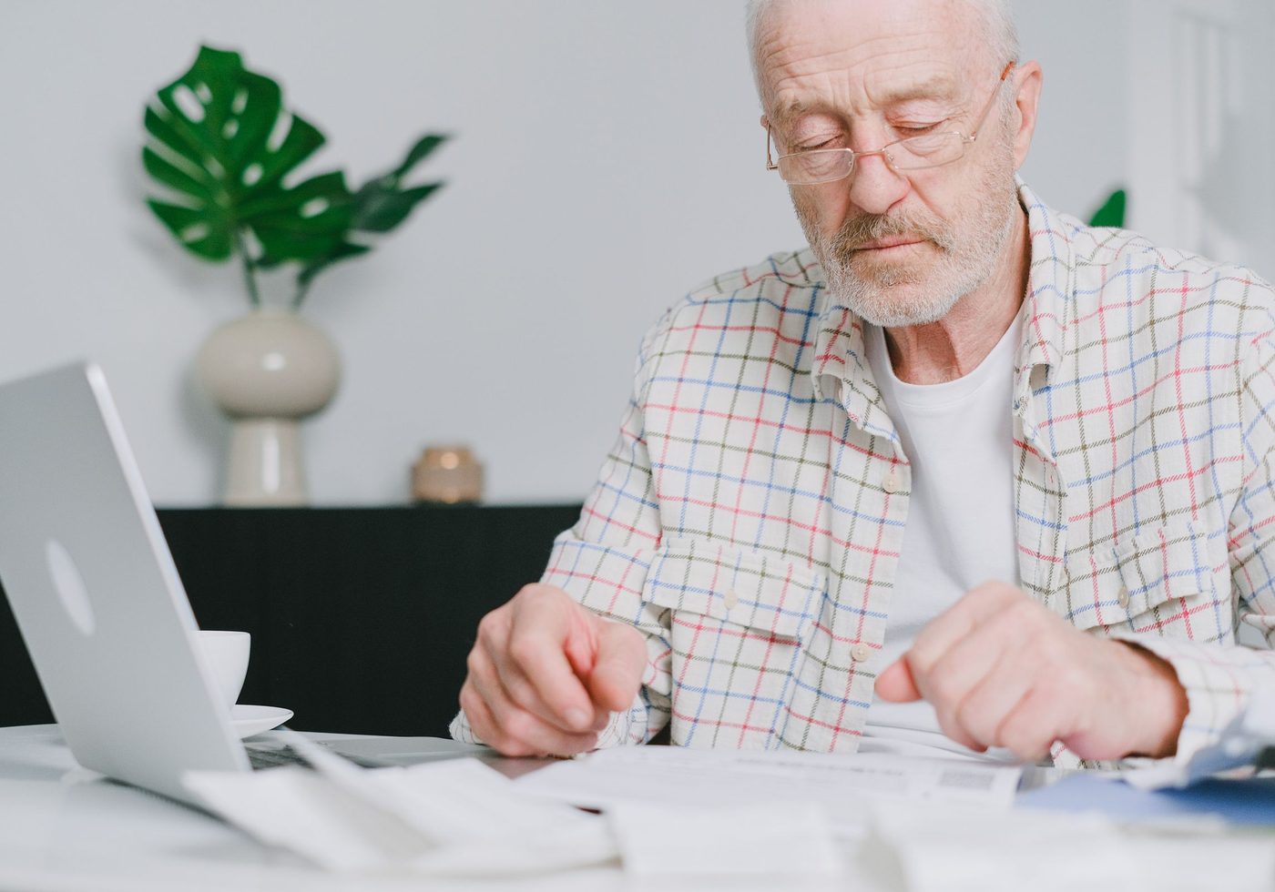 A business owner going through company paperwork
